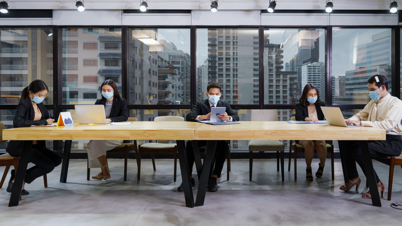 iStock-masked people in boardroom.jpg